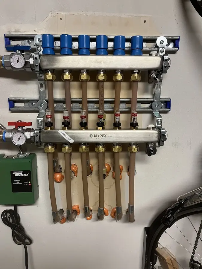 Plumber performing Water Heater Repair at a residential property in Adamsville